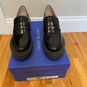Stuart Weitzman Glossy Black Women’s Slip-Ons